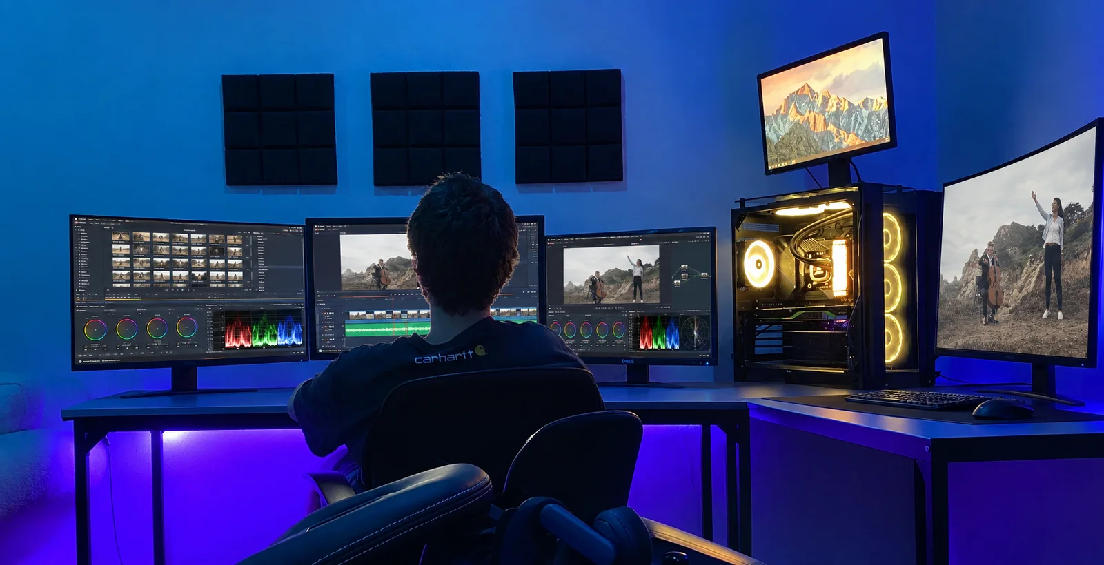 Editing a music video in DaVinci Resolve at a multi-monitor desk